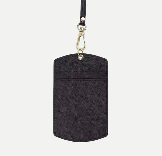 A black textured faux-leather ID badge holder with a gold-tone swivel clasp and wrist strap, shown against a plain white background.